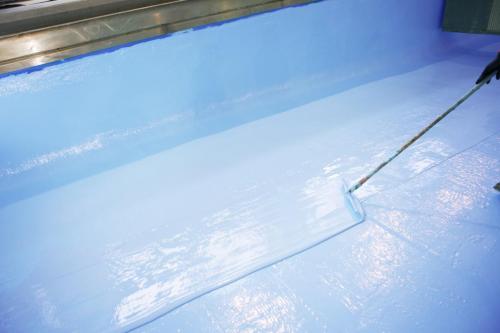 YMCA Lap Pool with base coat being applied
